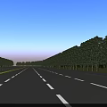 Urban Road Infrastructure Featuring Lane Markings Green Belts and Trees at Intersection
