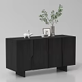 Modern Black Entryway Cabinet Sideboard With White Elephant Ornament Photo Frame And Green Plant Vase