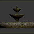 Three Tiered Stone Fountain With Weathered Surface And Round Base
