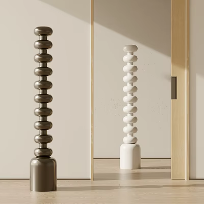 Brown and White Stacked Sphere Sculptures with Cylindrical Bases in Soft Light Interior 3d model