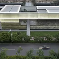 Contemporary Modern Building With Skylight Roof Glass Facade And Greenery