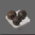 Delicious Chocolate Balls With Brown Stripes On White Plate For Sweet Dessert