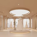Elegant Bridal Shop Interior Design With Displayed Wedding Dresses And Soft Lighting