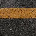 Yellow Traffic Line With Cracks On Black Asphalt Road Surface 3d model