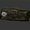 Close Up View of Stone Wood Block with Numbered Tag and Natural Texture