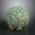 Decorative Sphere With Intricate Green Plant Patterns And Natural Design