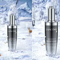 Lancôme Advanced Genifique Serum in Snowy Mountain Landscape With Deer And Cabin