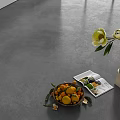 Gray Concrete Floor With Fresh Fruits Magazine And White Vase Flowers