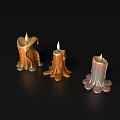 Lit Candle Lamps With Dripping Wax In Different Colors On Black Background