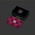 Colorful Chocolate Pieces Neatly Arranged In Black Box With Elegant Design And Attractive Presentation