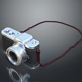 Classic Design Digital Camera With Silver Black Body And Red Strap On Black Background