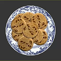 Golden Delicious Biscuits Arranged On Blue And White Patterned Plate 3d model