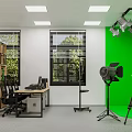 Media Studio With Green Backdrop Wall Lights Camera Tripod Desk Office Chairs Bookshelf Plants