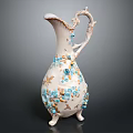 White Decorative Vase With Blue Gold Floral Patterns And Intricate Carved Details