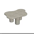 Modern White Stone Coffee Table With Irregular Top And Cylindrical Legs Design