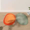 Stylish Oval Shaped Rugs in Orange and Green on Wooden Floor with Plants and Magazines