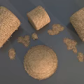 Round Hay Bales And Scattered Hay Piles In Natural Rural Setting