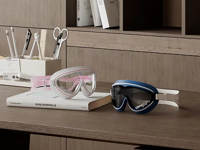 Pink And Blue Swimming Goggles On Wooden Desk With Books And Stationery 3d model
