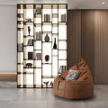 Modern Open Shelf Bookcase With Books Decorative Vases Sculptures And Bean Bag Chair