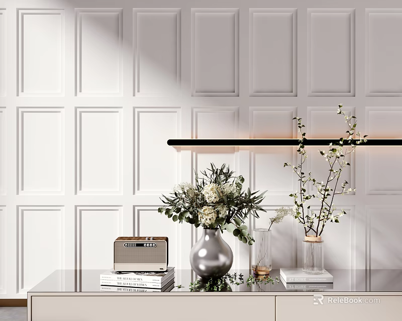 White Aquatic Plants in Silver Vase on Glass Table with White Paneled Wall and Black Pendant Light 3d model 