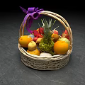 Delicious Assorted Fresh Fruits Arranged in Wicker Basket with Purple Ribbon