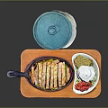 Delicious Sliced Chicken In Black Frying Pan With Side Dishes And Sauces On Wooden Tray