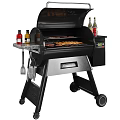 Black Outdoor Grill With Grilled Food Bottles And Hanging Tools Setup