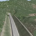 Road Infrastructure With Tunnel And Highway Passing Through Lush Mountain Vegetation