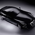 Black Luxury Sports Car With Sleek Aerodynamic Body Chrome Grille And Alloy Wheels