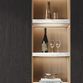 Elegant Decorative Ornament Set With Copper Cups Wine Bottle And Glasses On Marble Shelf