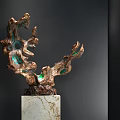 Decorative Ornament Set With Copper Green Artistic Sculpture On Marble Pedestal And Black Backdrop