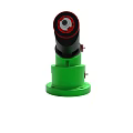 Green Base Mechanical Device Featuring Black Upper Part And Red Accent