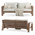 Two Seater Sofa with Wooden Frame Light Colored Cushions and Cozy Throw Blanket