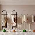 Modern Clothing Racks with Green and Orange Bases and Small Shelves for Hanging Clothes and Bags