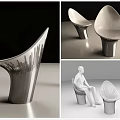 Modern Leisure Chair With Sculptural Curved Shape And Elegant Metallic Design