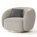 Light Gray Herringbone Accent Chair With Black Geometric Pillow And Gold Round Base