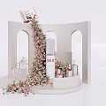 Floral Installation with Pink Flowers Arches and SK-II Products on White Display Stand