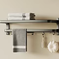 Bathroom Wall Shelf With Folded Towels Hanging Towel Hooks And Decorative Items