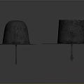 Two Shiny Metal Hat Shaped Household Items With Wide Brims On Dark Background