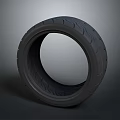 New Car Tire With Deep Tread Pattern Isolated On Gray Background