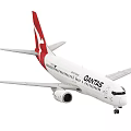 Qantas Commercial Passenger Airplane With White Body And Red Tail Design