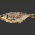 Whole Dried Fish with Golden Brown Appearance and Dry Textured Surface