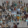 Large Diverse Group of People Interacting in Open Space with Various Poses