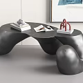 Black Sculptural Coffee Table With Books And Decorative Object In Modern Interior 3d model