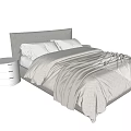 Modern Double Bed With Gray Comforter White Pillows And Nightstands In Bedroom
