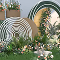 Outdoor Photo Check In Spot With Green Grass And Circular Ring Flower Decorations