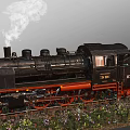 Black Steam Train Model With Red Wheels On Green Grass Track 3d model