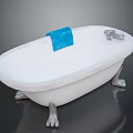 Elegant White Clawfoot Bathtub With Blue Towel And Silver Faucet