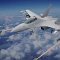 Fighter Jet Flying Over Clouds With Mounted Missiles In Blue Sky