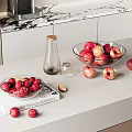Fresh Apples in Glass Bowls on Kitchen Counter with Decorative Books